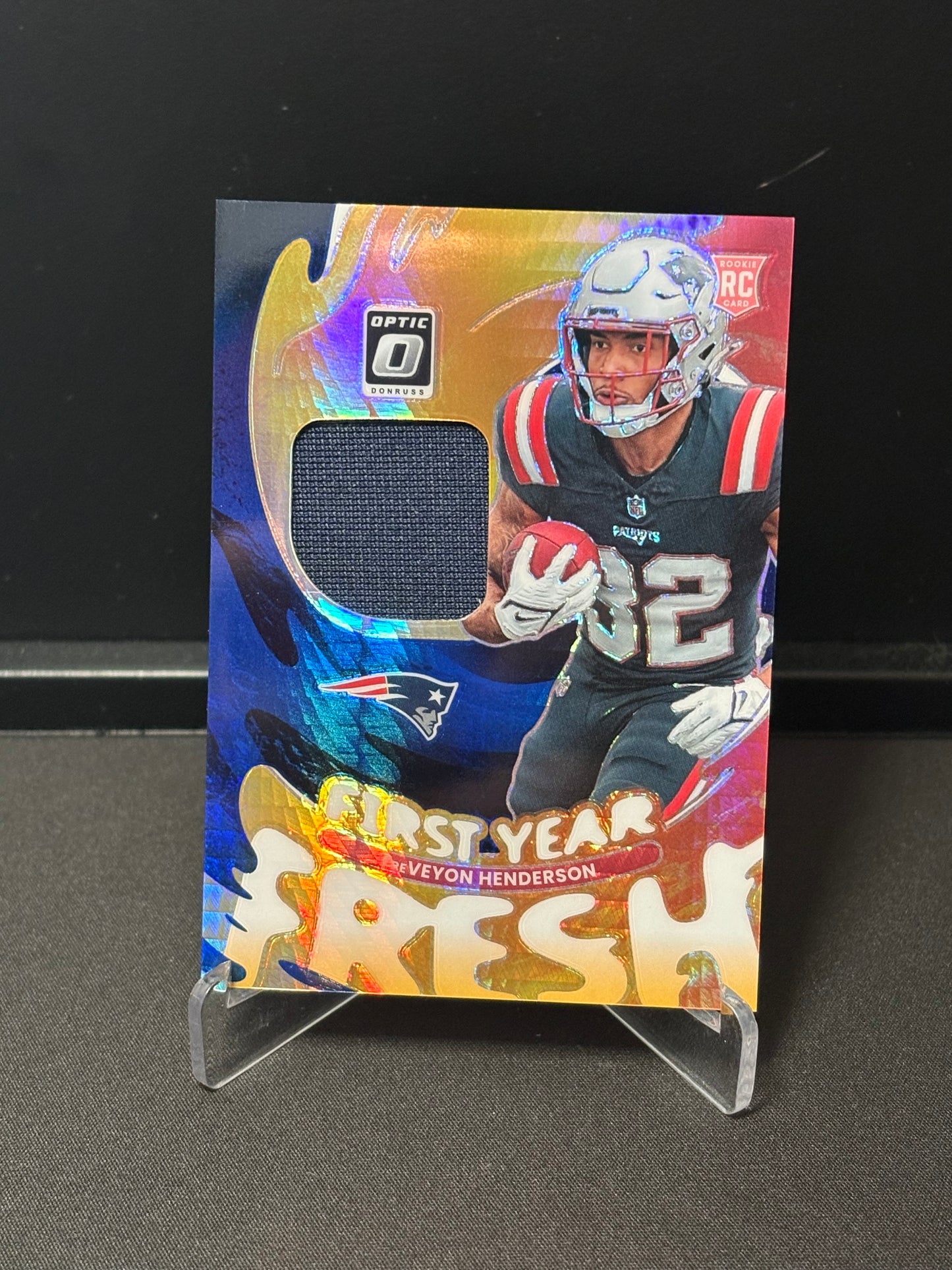 TreVeyon Henderson RC Panini Donrus Optic 2025 "First Year Fresh" New England Patriots